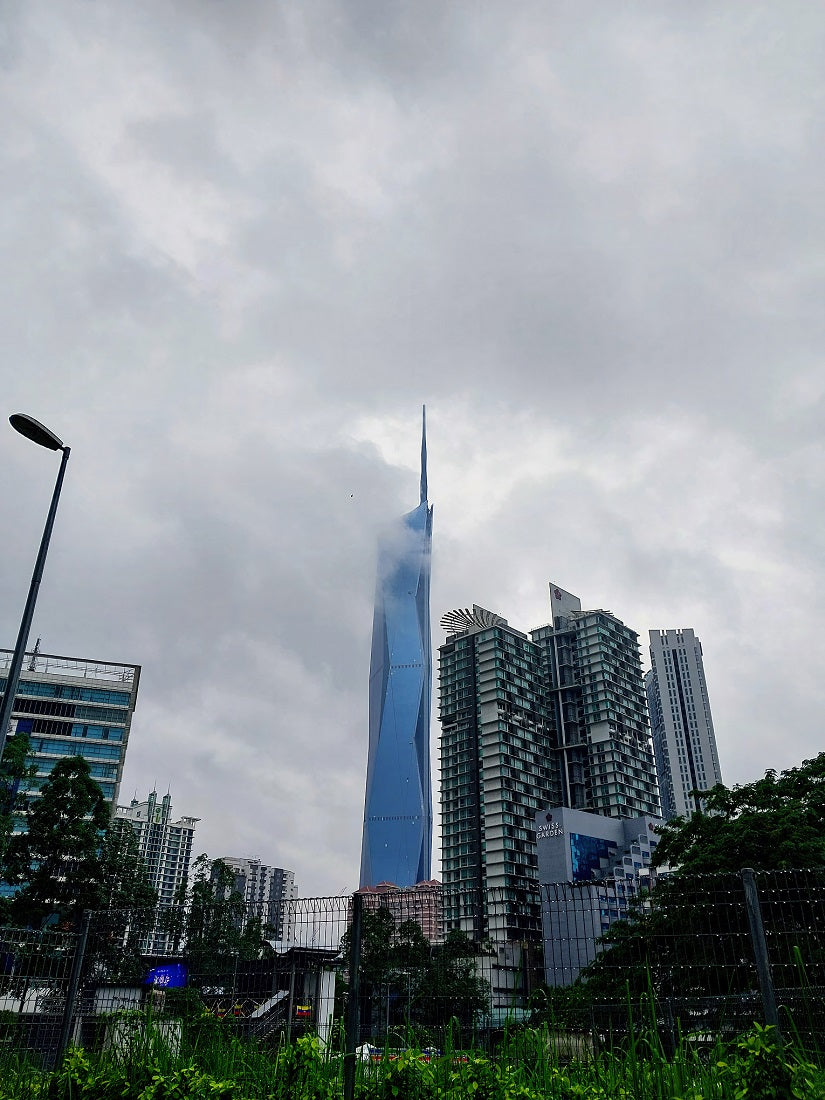 Kuala Lumpur: Merdeka 118 Tower under clouds